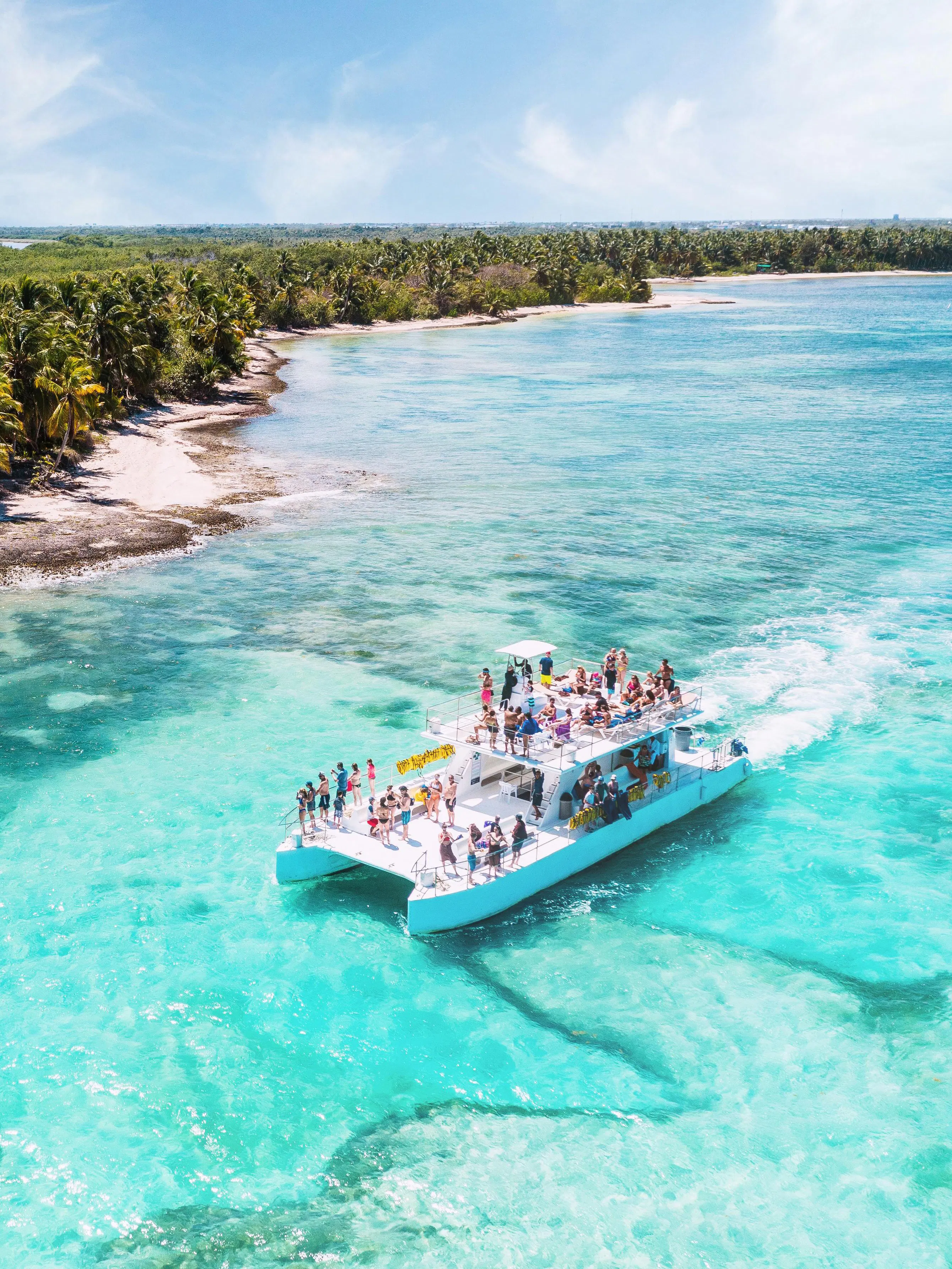 Catamaran with tourists sailing near Saona Island, Dominican Republic.