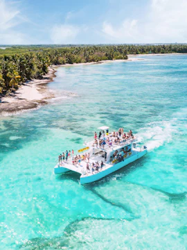 Catamaran with tourists sailing near Saona Island, Dominican Republic.