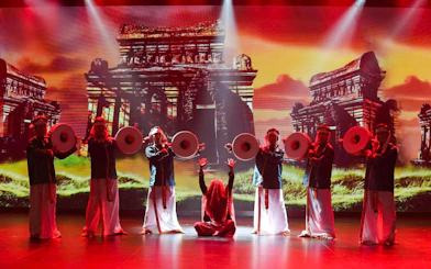 Traditional performers with drums at The Heritage Show, Da Nang, Vietnam, highlighting local culture.
