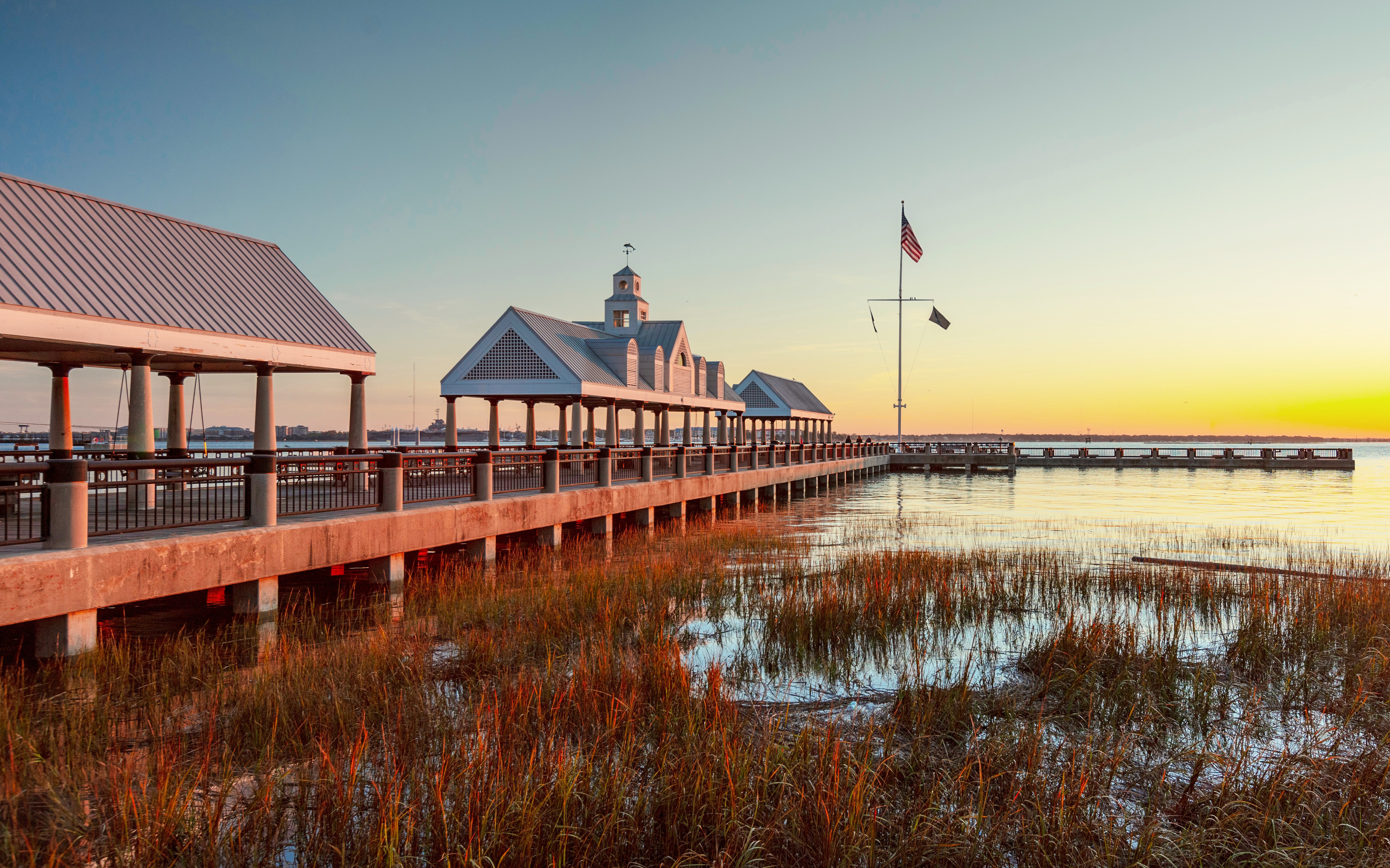 Sunrise over Charleston Harbor with pier and pavilion, Charleston, South Carolina, November 2019.