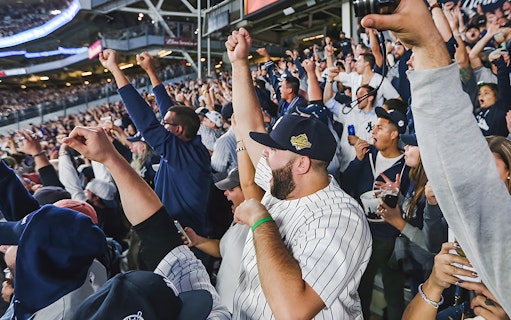 Fans cheering at a New York Yankees vs Boston Red Sox game, June 10, 2023.