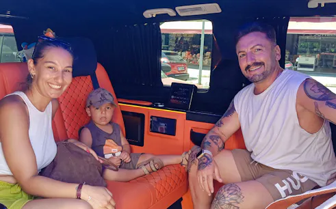 Family enjoying a private VIP airport transfer in Antalya vehicle.