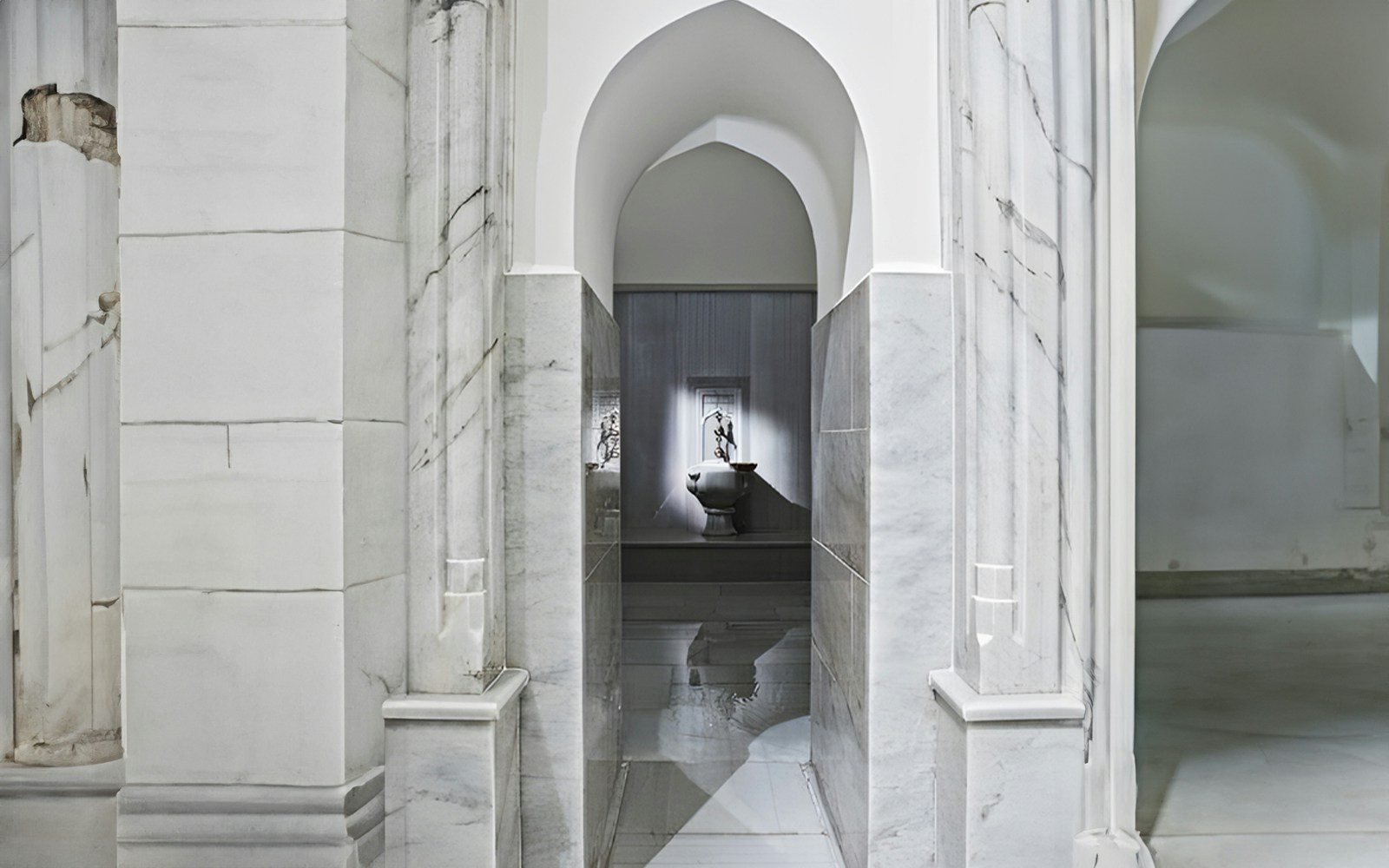 Hurrem Sultan Hamam interior with ornate marble basin in Istanbul.