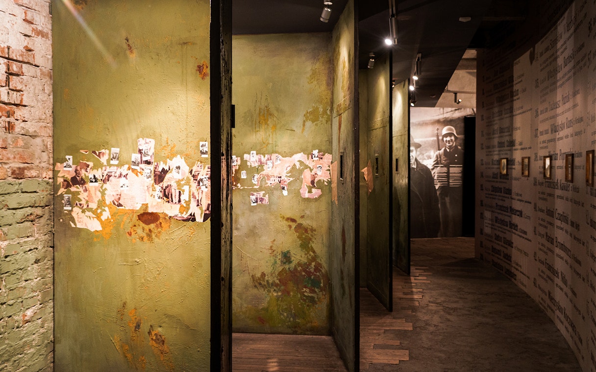 Hallway with historical photos and text at Oskar Schindler’s Factory in Krakow.