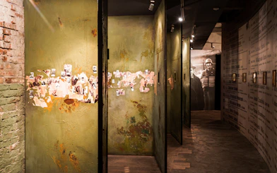 Hallway with historical photos and text at Oskar Schindler’s Factory in Krakow.