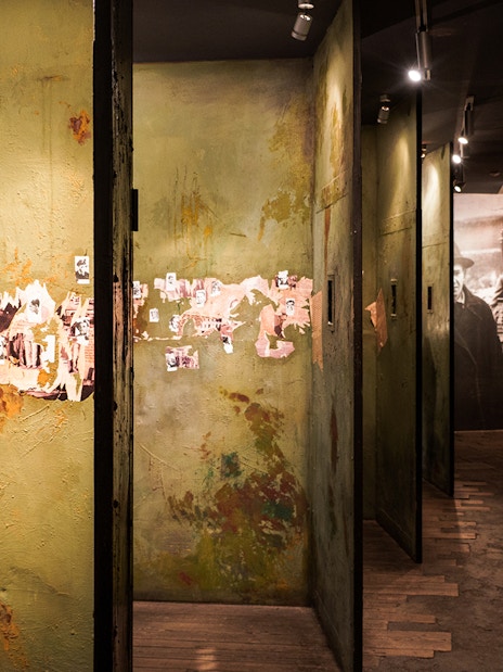 Hallway with historical photos and text at Oskar Schindler’s Factory in Krakow.