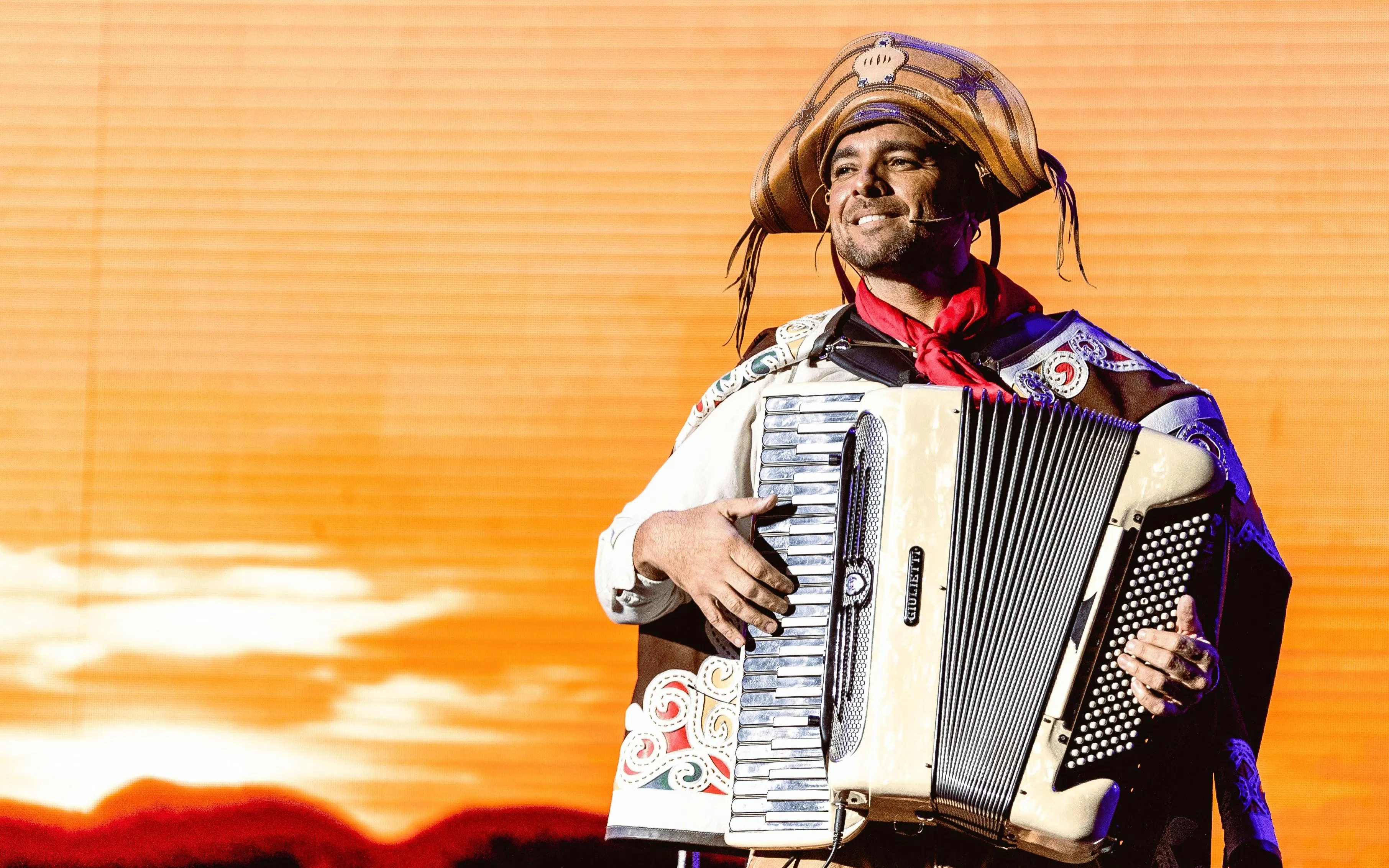 Musician playing accordion at Roxy Dinner Show in Rio de Janeiro.