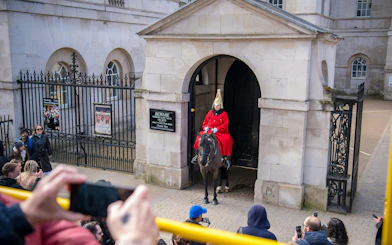 Horse Guard at Horse Guards Parade, London, viewed from a hop-on hop-off bus tour.