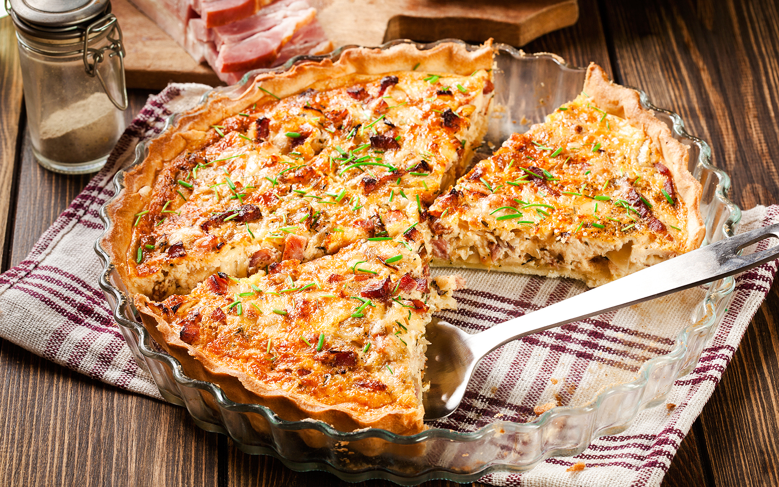Vegetable tart with herbs in Douro Valley setting.