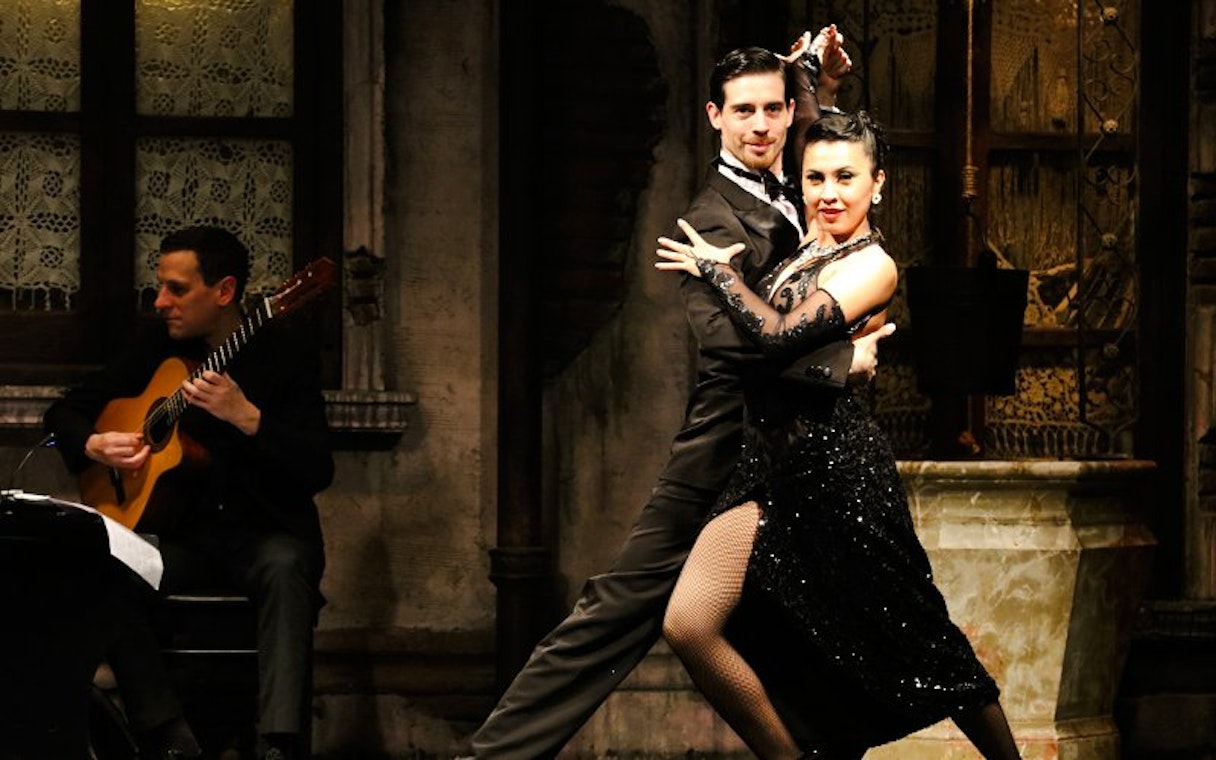Tango dancers performing at Aljibe Tango Show in Buenos Aires.