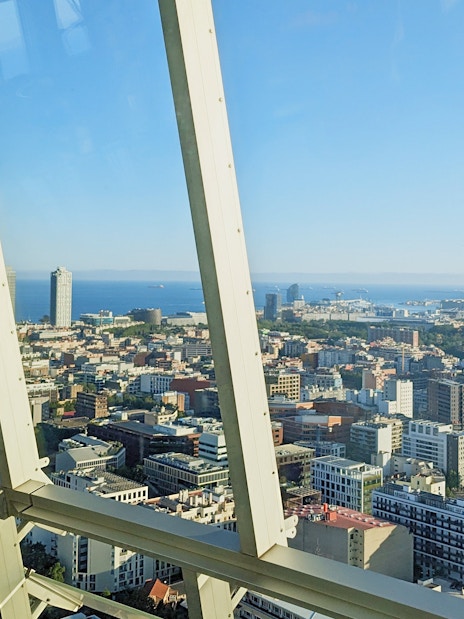 View of Barcelona cityscape and coastline from Glories Skyline Tower.