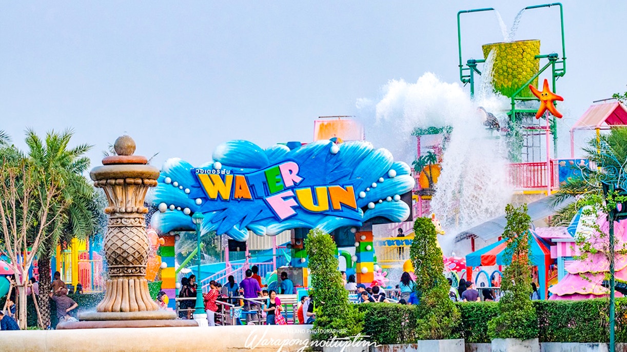 Dreamworld Bangkok water park entrance with colorful slides and splashing water.