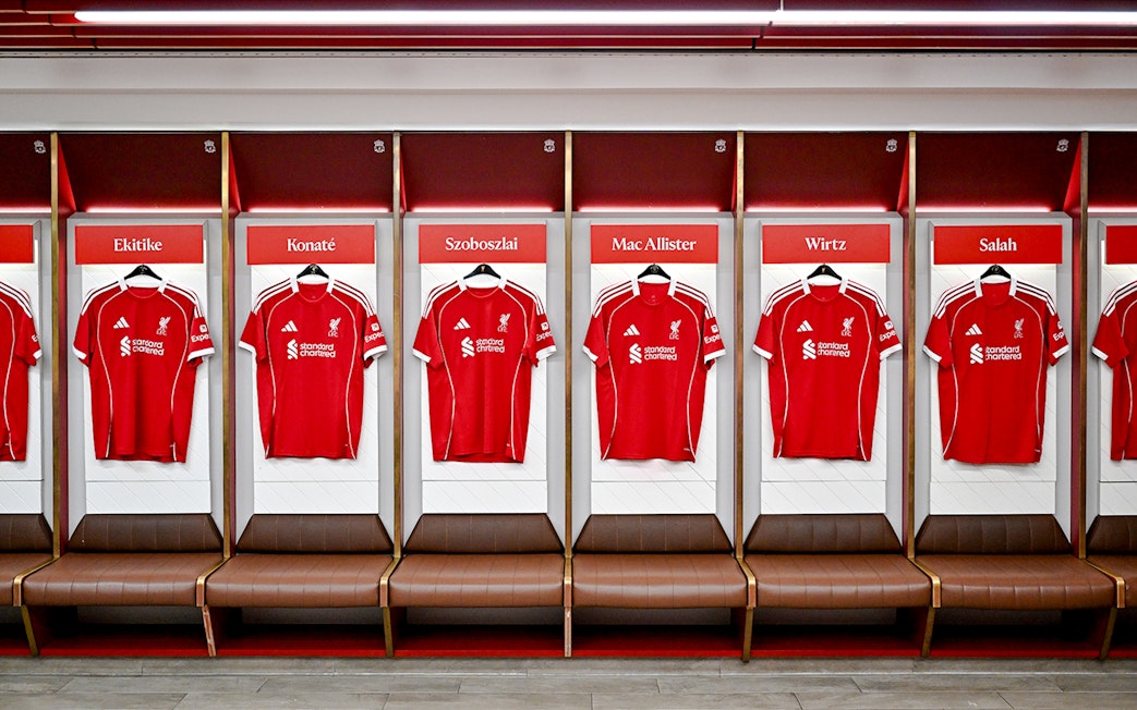 Liverpool FC jerseys in the Anfield Arena dressing room.
