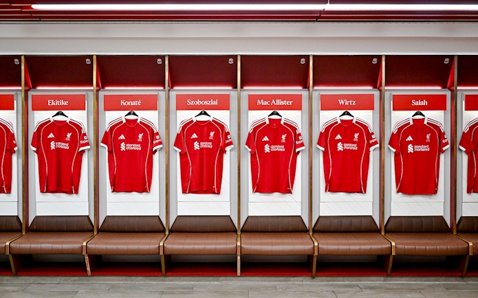 Liverpool FC jerseys in the Anfield Arena dressing room.