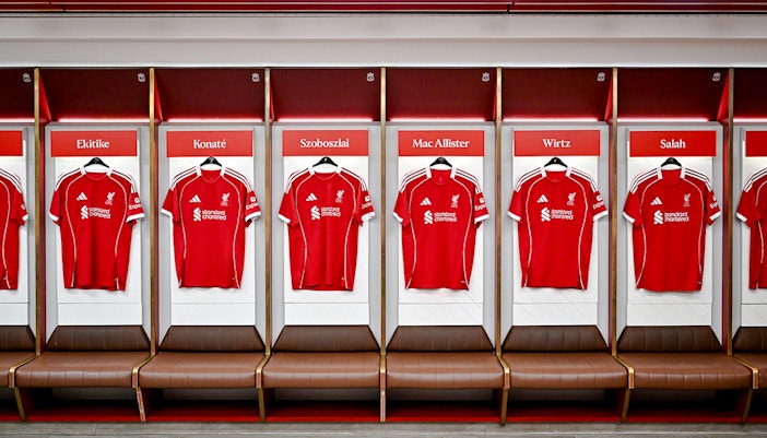 Liverpool FC jerseys in the Anfield Arena dressing room.