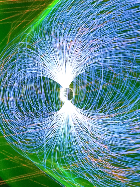 Visualization of Earth's magnetic field lines at the American Museum of Natural History exhibition.