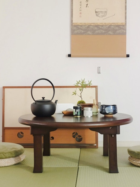 Traditional Japanese tea room setup with tatami mats, tea set, and kimono in Tokyo Matcha & Kimono Experience.