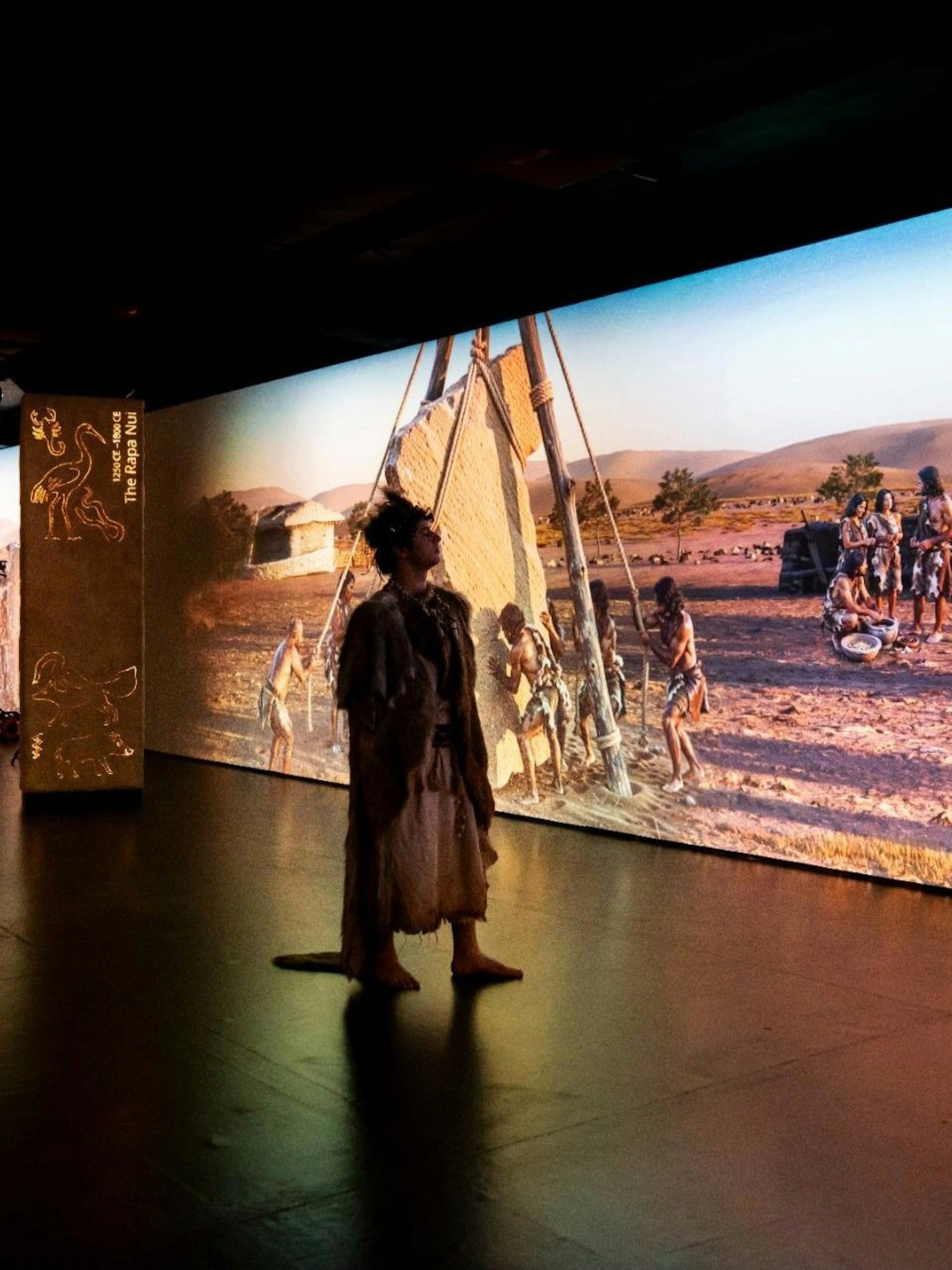 Timewalk Exhibition at Immerse LDN showcasing prehistoric village scene.
