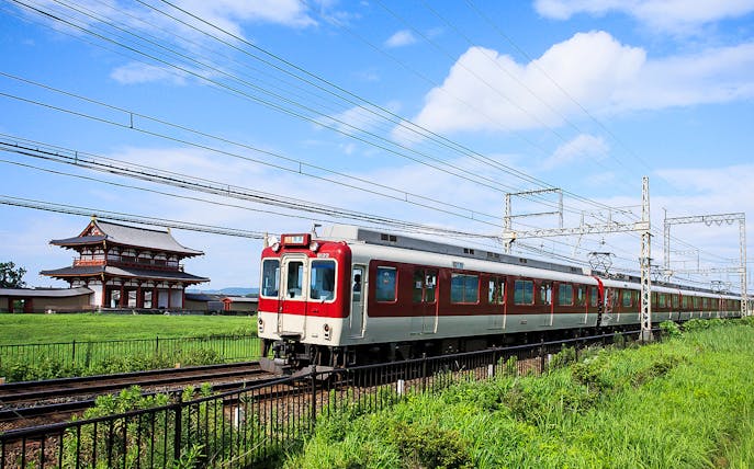 Kintetsu train passing by Heijo Palace in Nara, Japan.