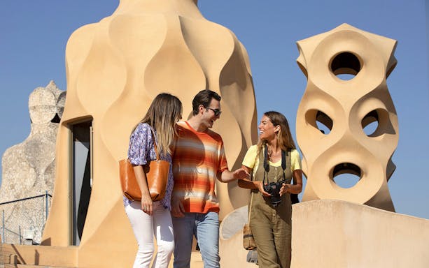 Visitors enjoying the rooftop of Casa Milà in Barcelona.