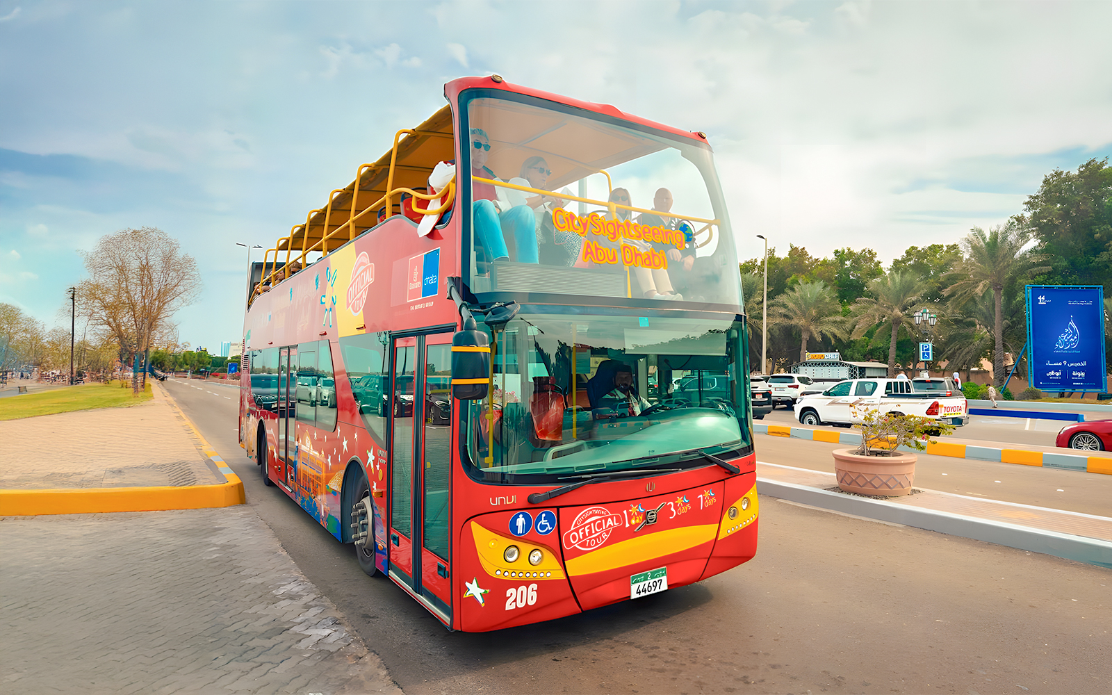 Open-top double-decker bus on Abu Dhabi City Sightseeing tour.