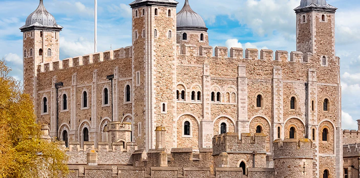 Tower of London with historic stone walls and turrets, United Kingdom.