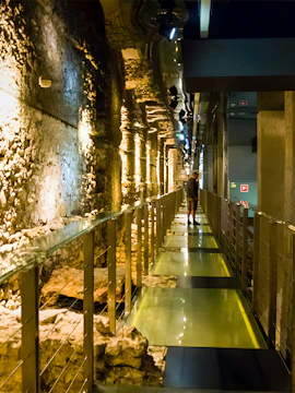 Walkway through ancient ruins at Rynek Underground Museum, Krakow.
