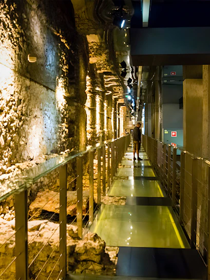 Walkway through ancient ruins at Rynek Underground Museum, Krakow.