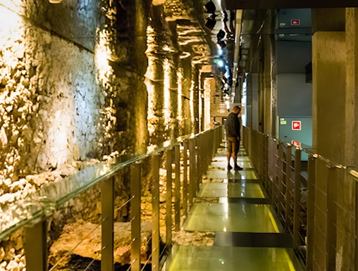 Walkway through ancient ruins at Rynek Underground Museum, Krakow.