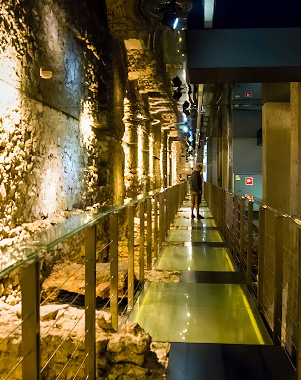 Walkway through ancient ruins at Rynek Underground Museum, Krakow.