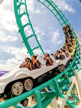 Roller coaster with riders at Dreamworld, Gold Coast, Australia.