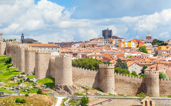 Medieval walls surrounding the historical city of Avila, Spain.