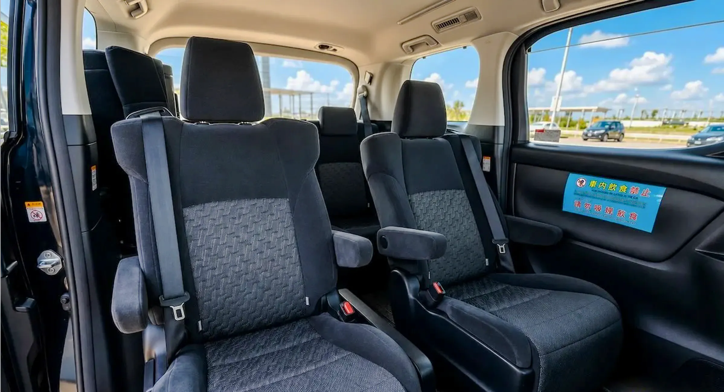 Private transfer vehicle interior for Haneda Airport to Tokyo city route.