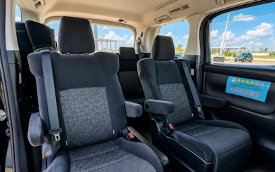 Private transfer vehicle interior for Haneda Airport to Tokyo city route.