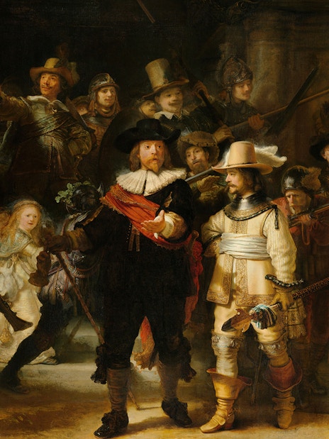 Rijksmuseum visitors viewing Rembrandt's "The Night Watch" in Amsterdam, highlighting Dutch art.