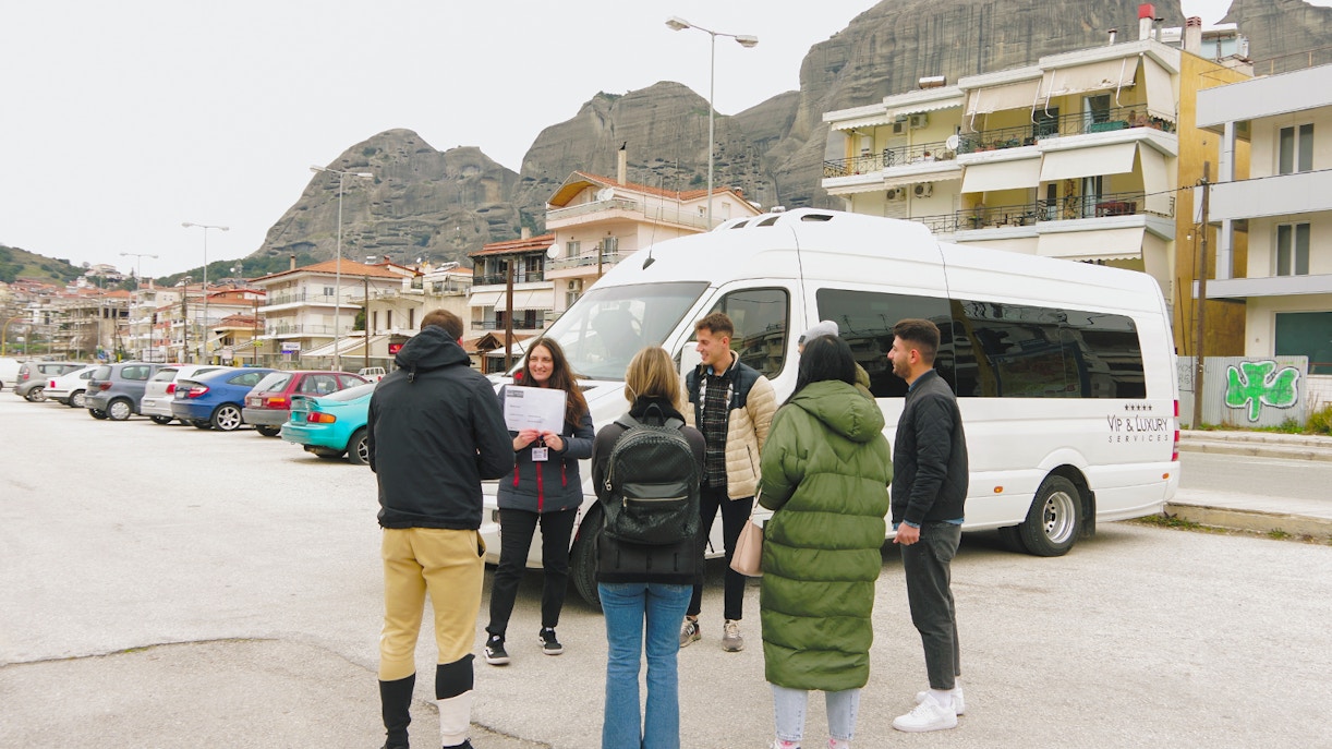 Meteora rock formations with monasteries, part of full-day tour from Athens including transfers.