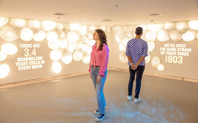 Guests viewing yeast cell exhibit at Guinness Storehouse.