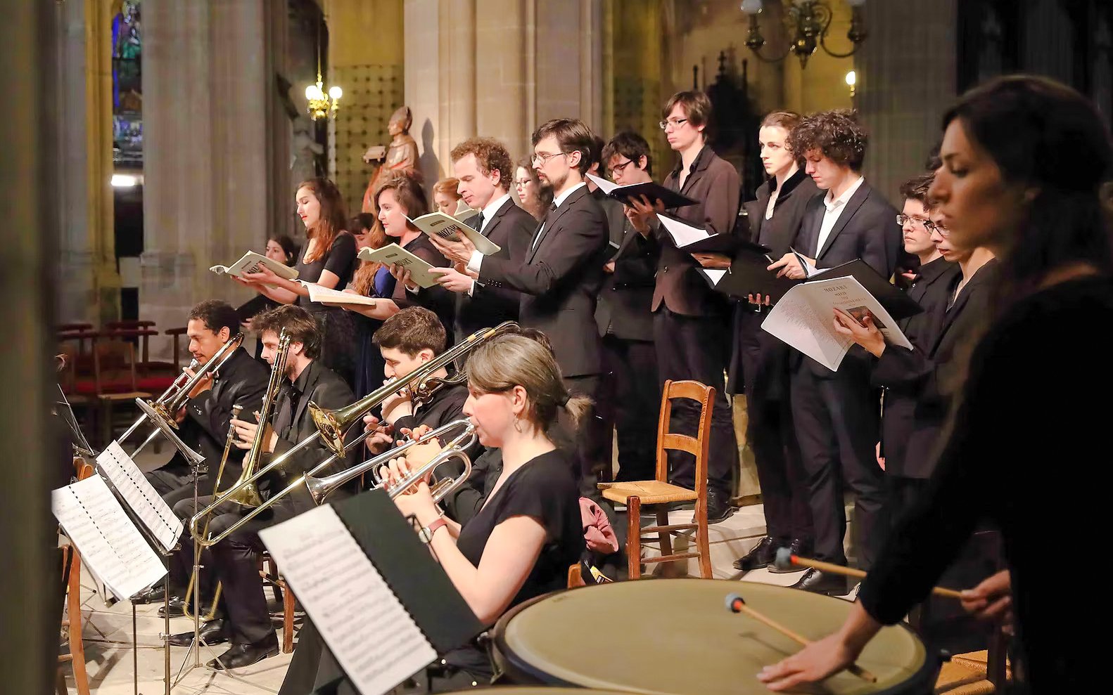 Orchestra and choir performing in St Sulpice Church, Paris.