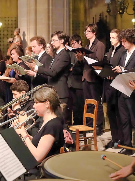 Orchestra and choir performing in St Sulpice Church, Paris.