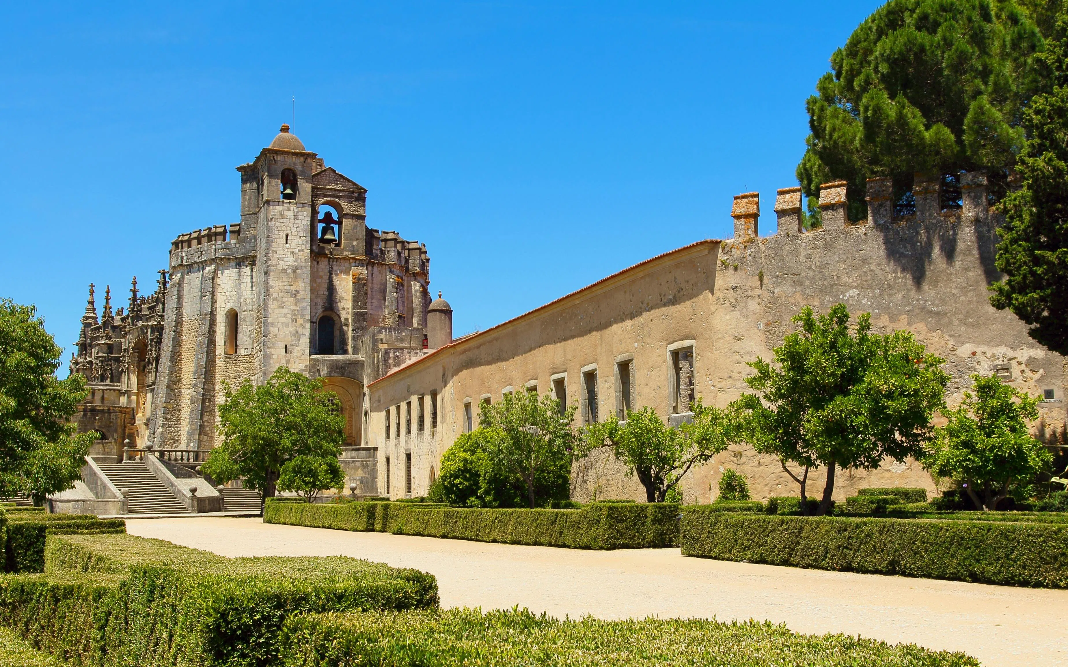 Templar knights castle in Tomar, Portugal with historic architecture and gardens.