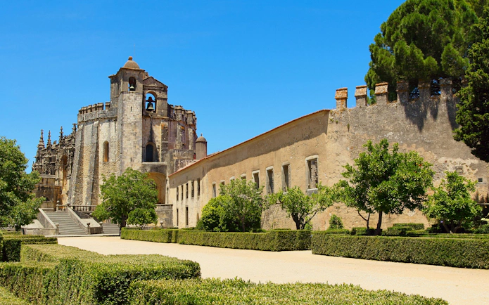 Templar knights castle in Tomar, Portugal with historic architecture and gardens.