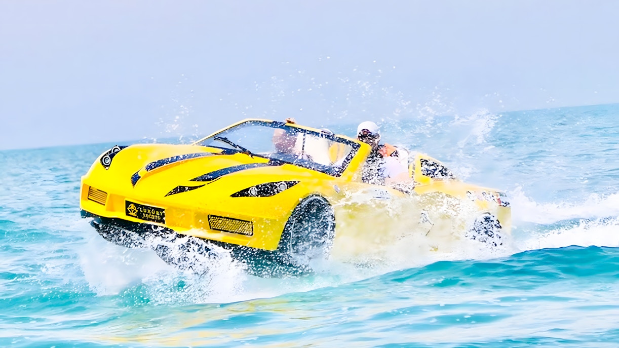 Couple riding jet car in Dubai