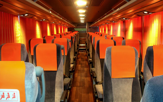 Bus interior for Narita Airport transfers to Shinjuku, T-CAT, and YCAT in Tokyo.