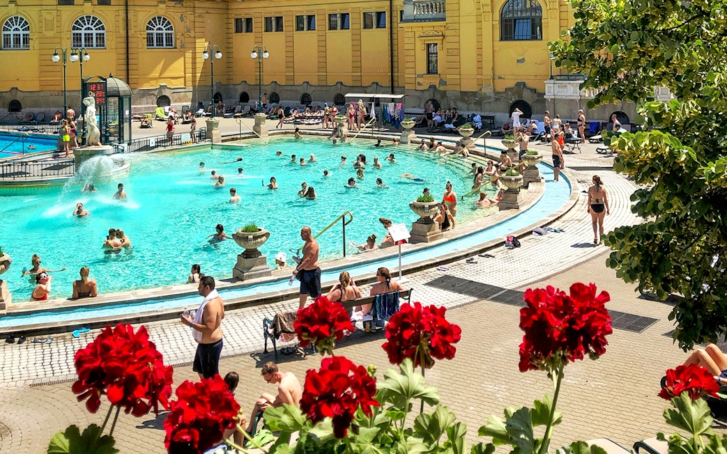 Guests relaxing in the pools at Széchenyi Spa, Budapest.