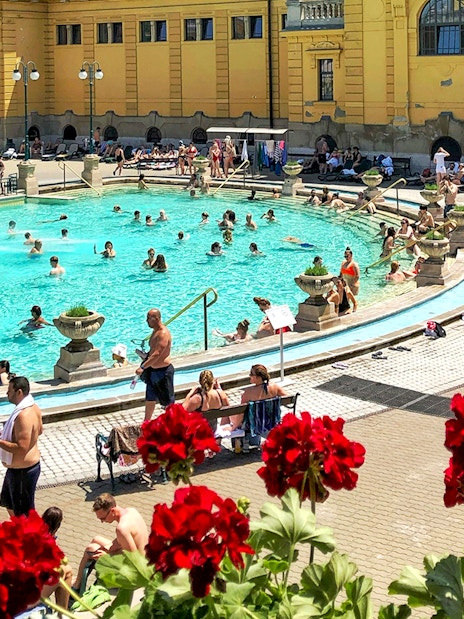 Guests relaxing in the pools at Széchenyi Spa, Budapest.