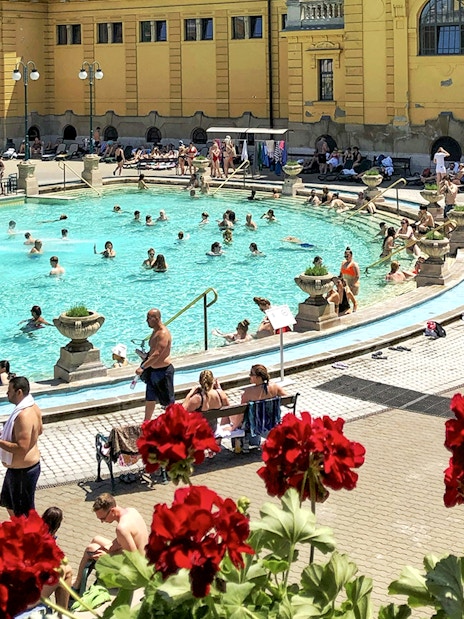Guests relaxing in the pools at Széchenyi Spa, Budapest.