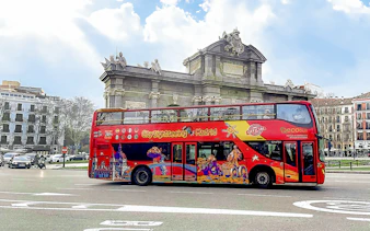 City sightseeing bus near Puerta de Alcalá, Madrid.