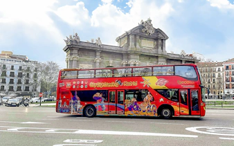 City sightseeing bus near Puerta de Alcalá, Madrid.