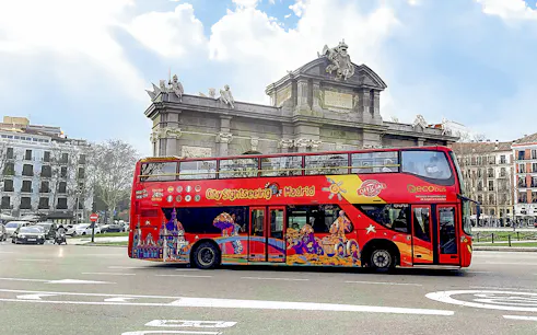 City sightseeing bus near Puerta de Alcalá, Madrid.