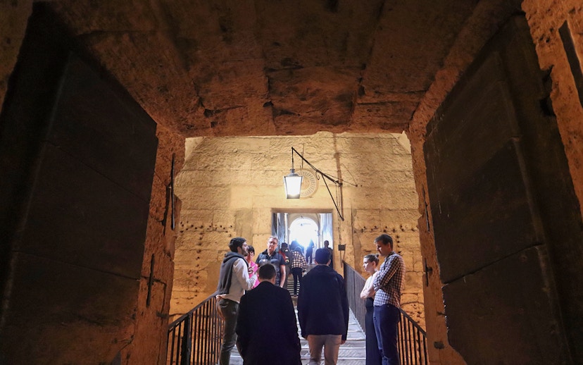 Visitors exploring the interior of Castel Sant'Angelo, Rome.